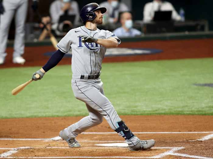 Oct 21, 2020; Arlington, Texas, USA; Tampa Bay Rays second baseman Brandon Lowe (8) connects for a solo home run in the 1st inning against the Los Angeles Dodgers in game two of the 2020 World Series at Globe Life Field.